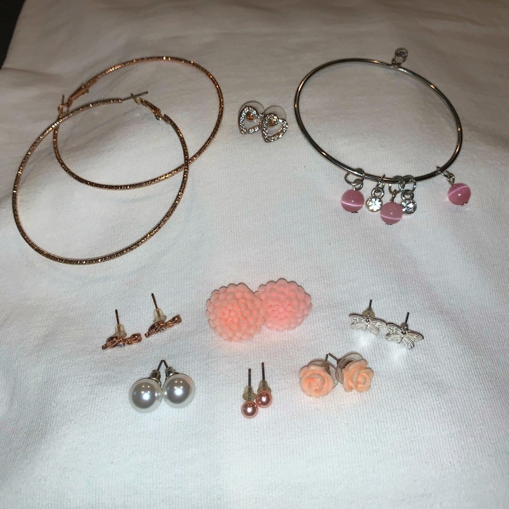 Pretty in pink jewelry set includes earrings and bracelets